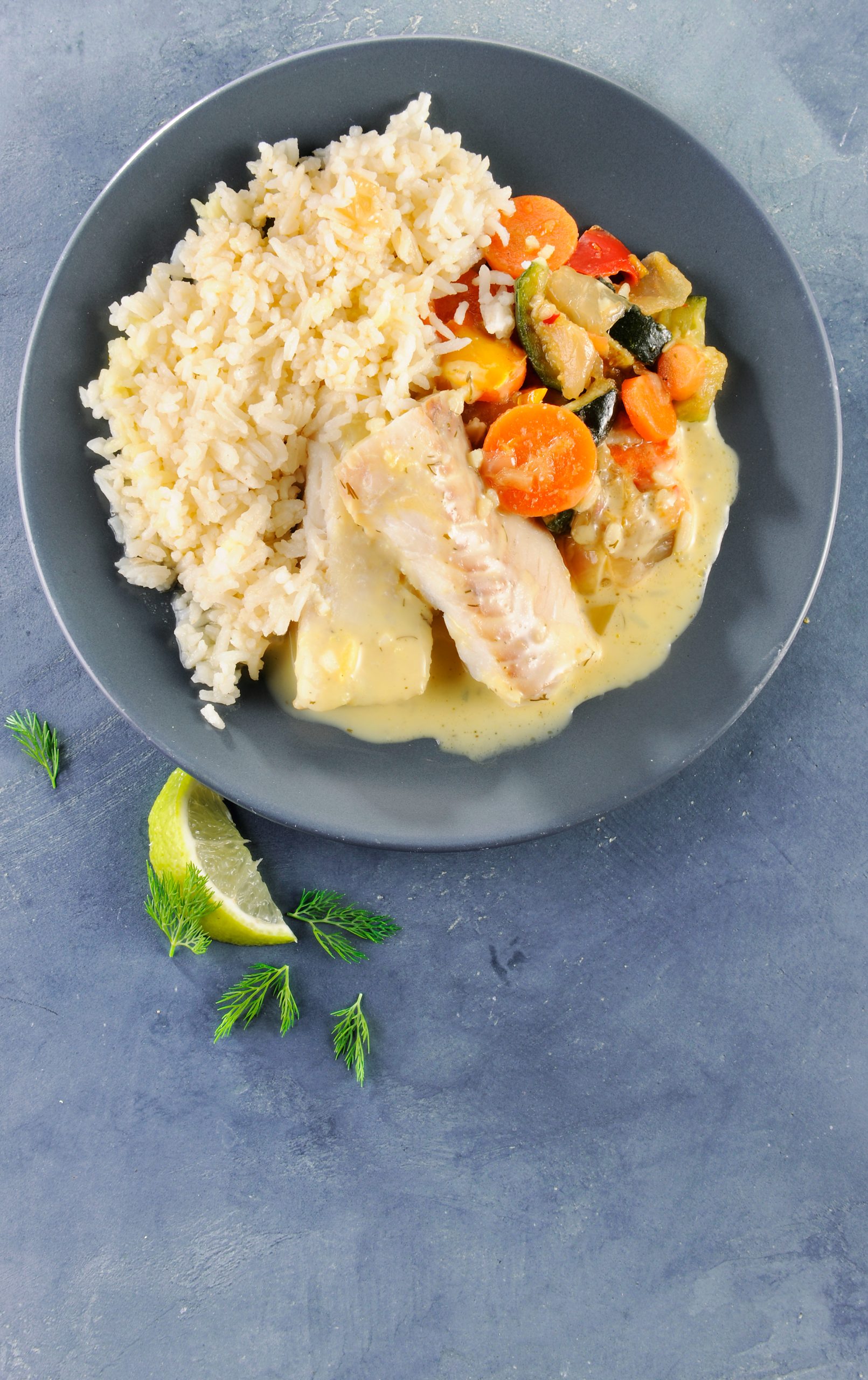 dos de colin d’Alaska sauce crème citron riz basmati et légumes